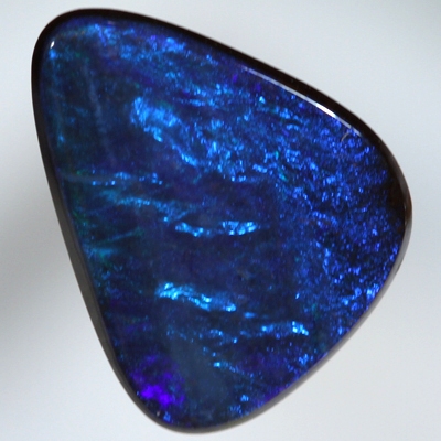 SOLID BOULDER OPAL Bright turquoise blue sparkles over deep ocean blue